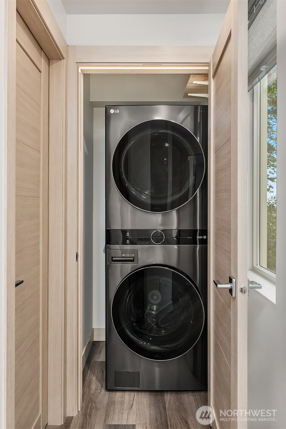 5616 California Avenue Southwest, Unit C Seattle, WA 98136 - Photo 27 of 36 a close view of a washer and dryer in a bathroom