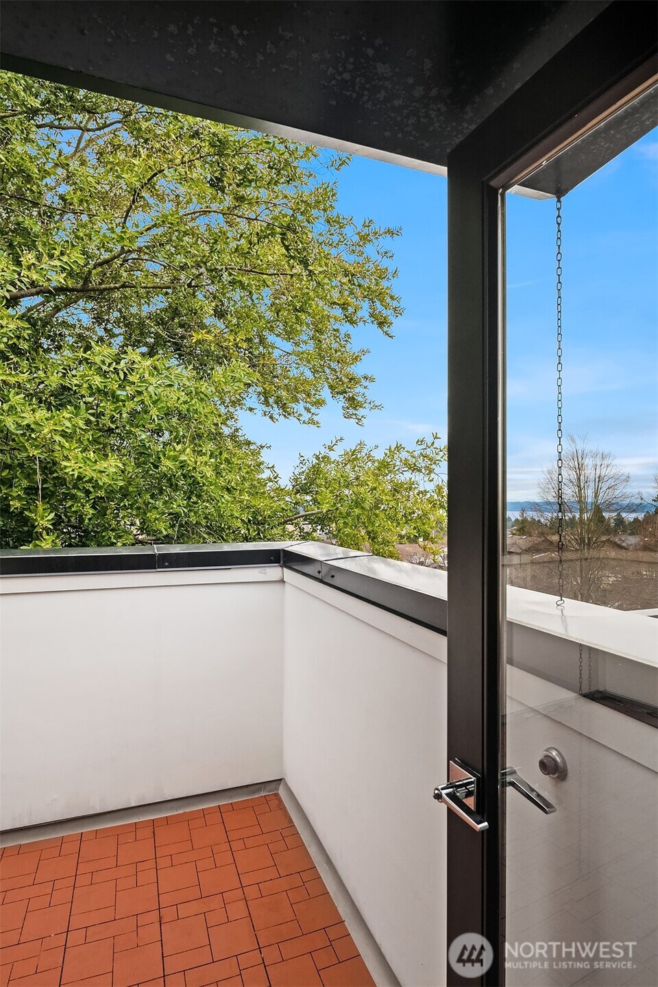 5616 California Avenue Southwest, Unit C Seattle, WA 98136 - Photo 28 of 36 a view of a balcony from a window