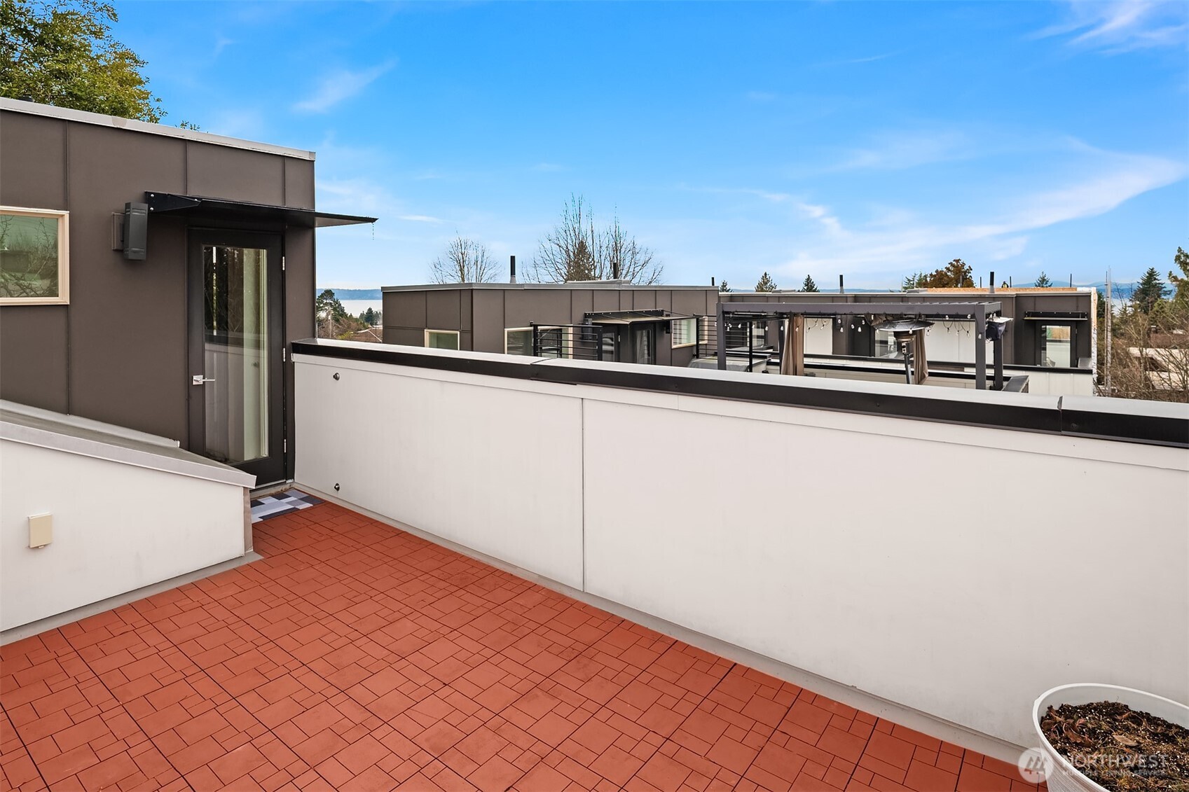 5616 California Avenue Southwest, Unit C Seattle, WA 98136 - Photo 31 of 36 a view of a terrace with sky view