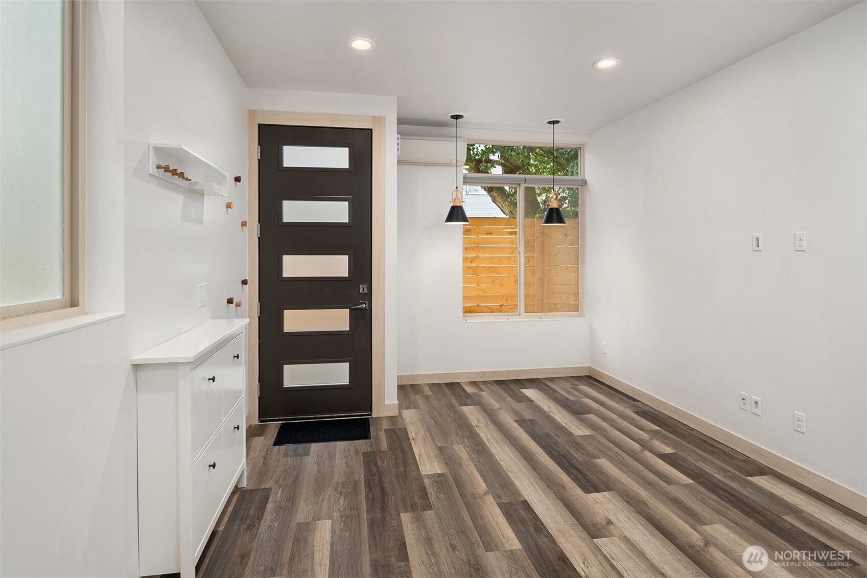 5616 California Avenue Southwest, Unit C Seattle, WA 98136 - Photo 5 of 36 wooden floor in a hall with an entryway