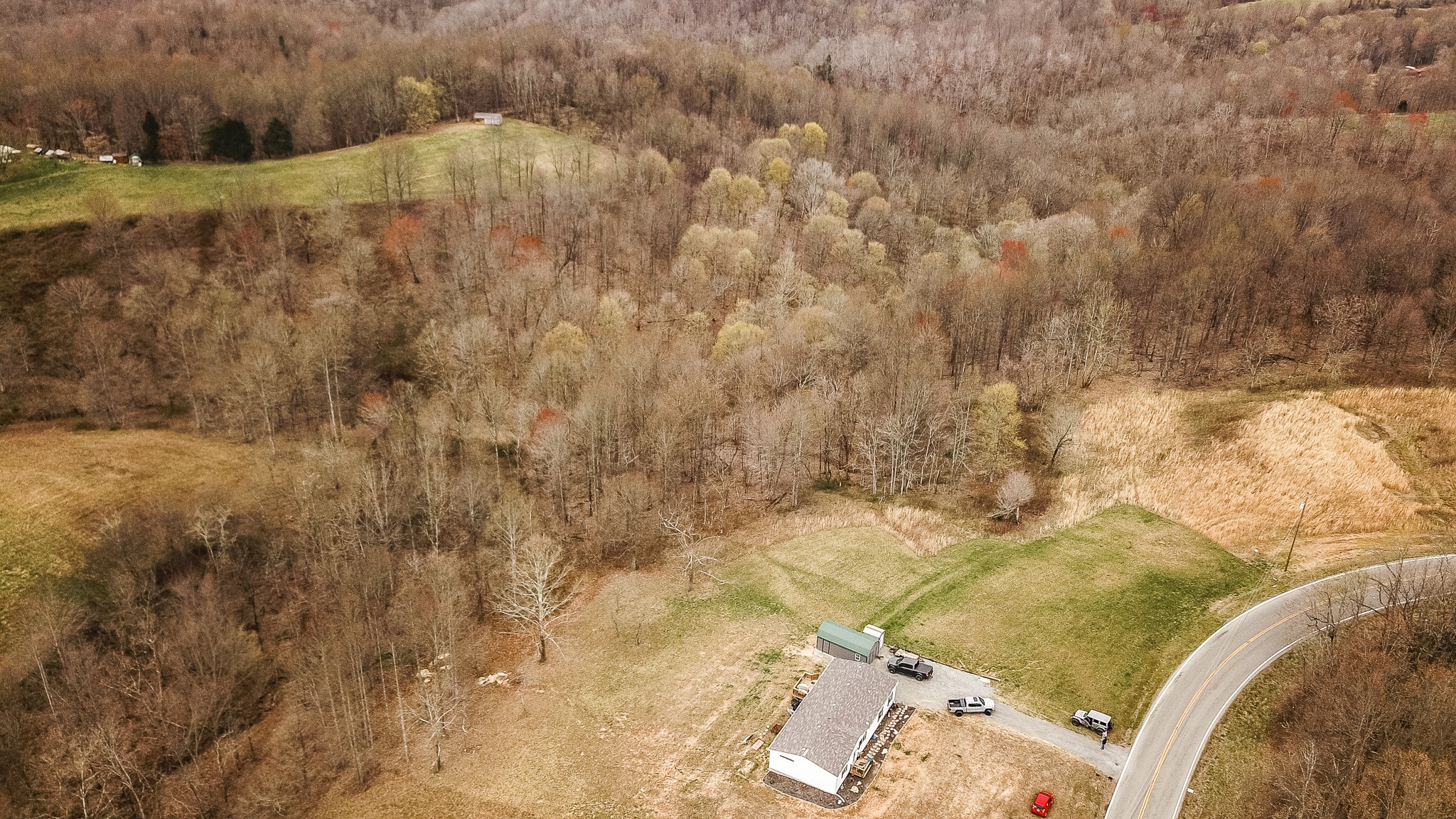 1690 Green Grove Road Hartsville, TN 37074 - Photo 14 of 16 a view of a dry yard with wooden fence