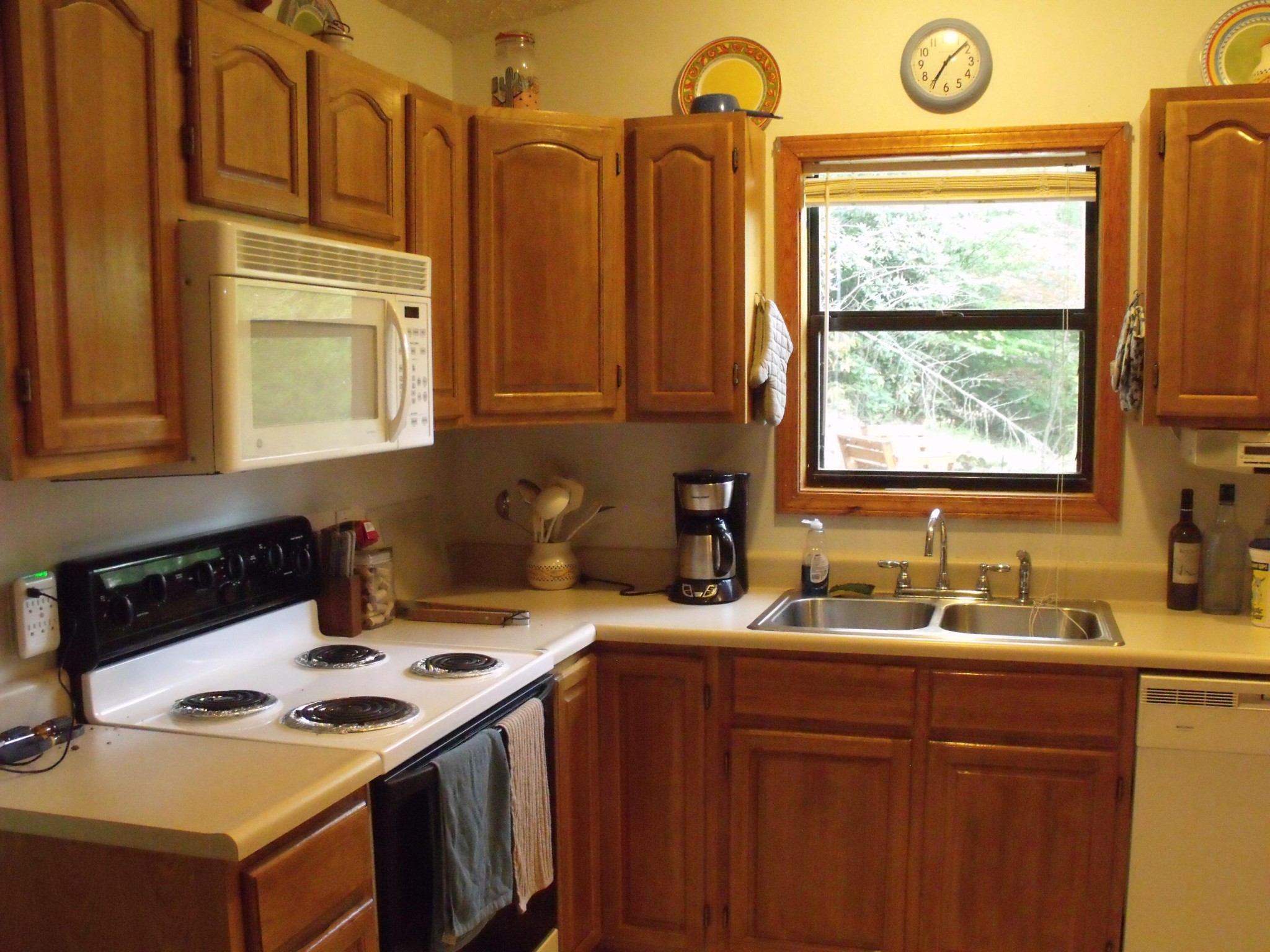 3515 Rocky Ridge Road Cosby, TN 37722 - Photo 19 of 33 a kitchen with a sink a stove and a window
