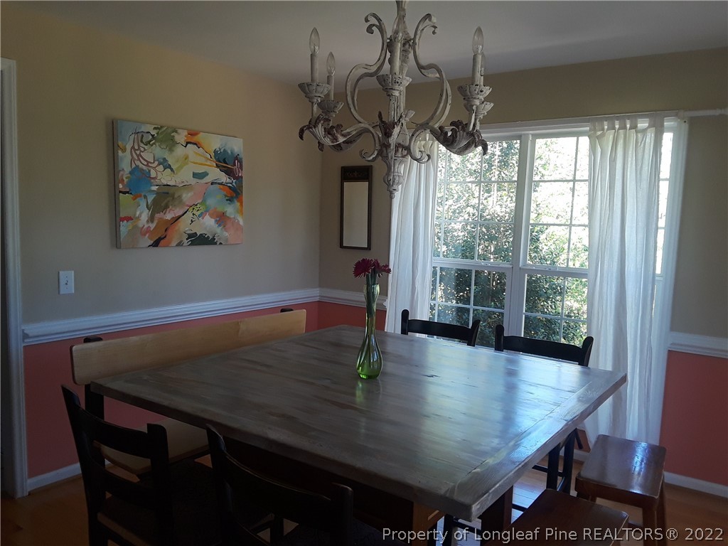 281 Stubby Oaks Road Aberdeen, NC 28315 - Photo 3 of 15 a dining room with furniture and window