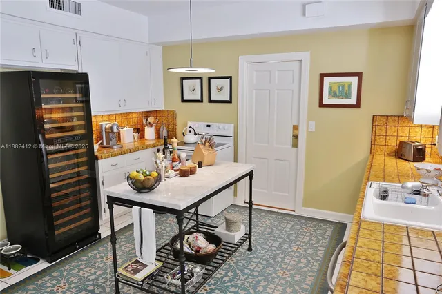 a view of a workspace with furniture