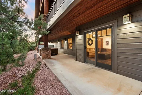 an aerial view of residential house with an outdoor space