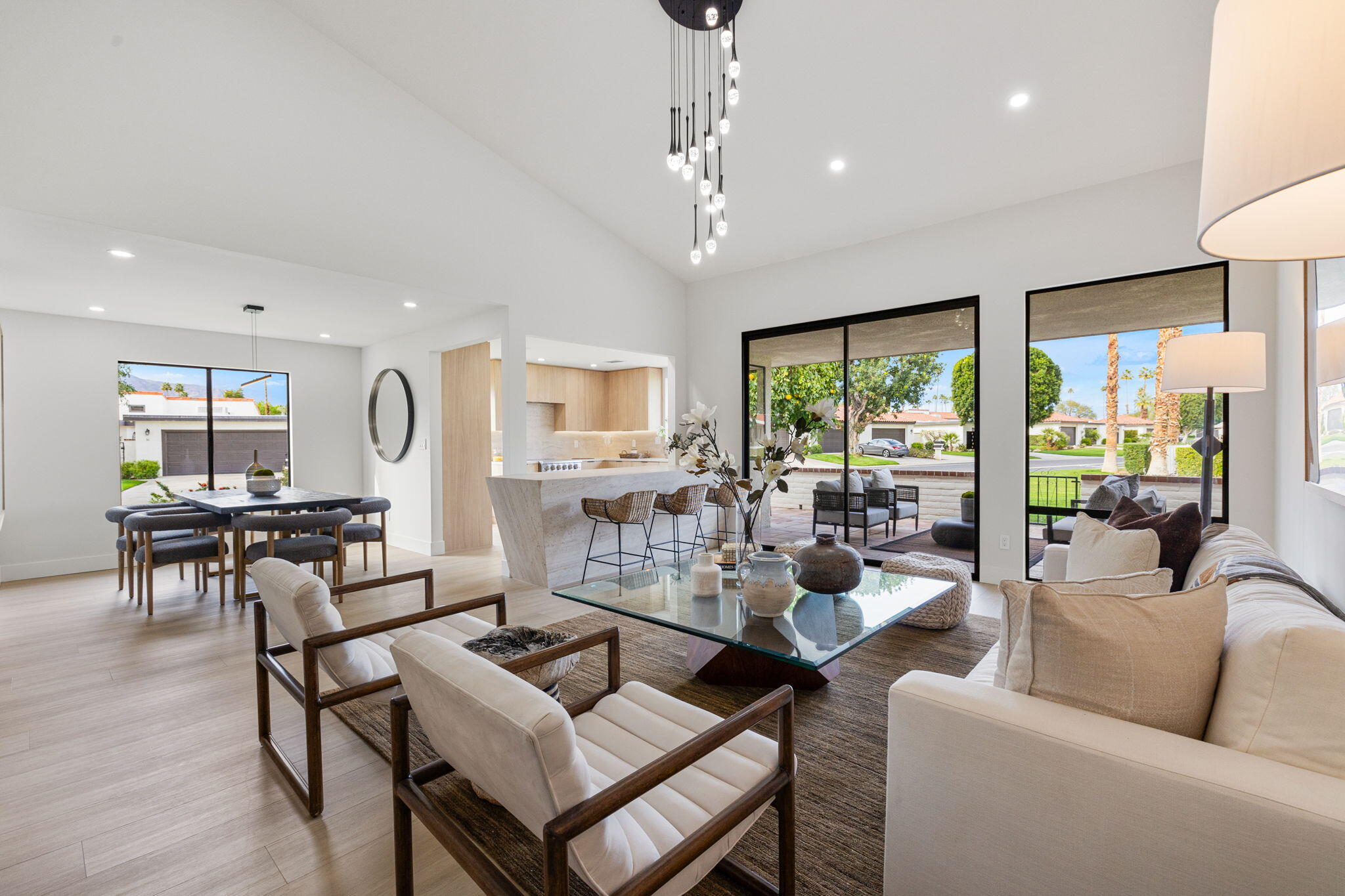 2 Leon Way Rancho Mirage, CA 92270 - Photo 23 of 55 a living room with furniture and a large window