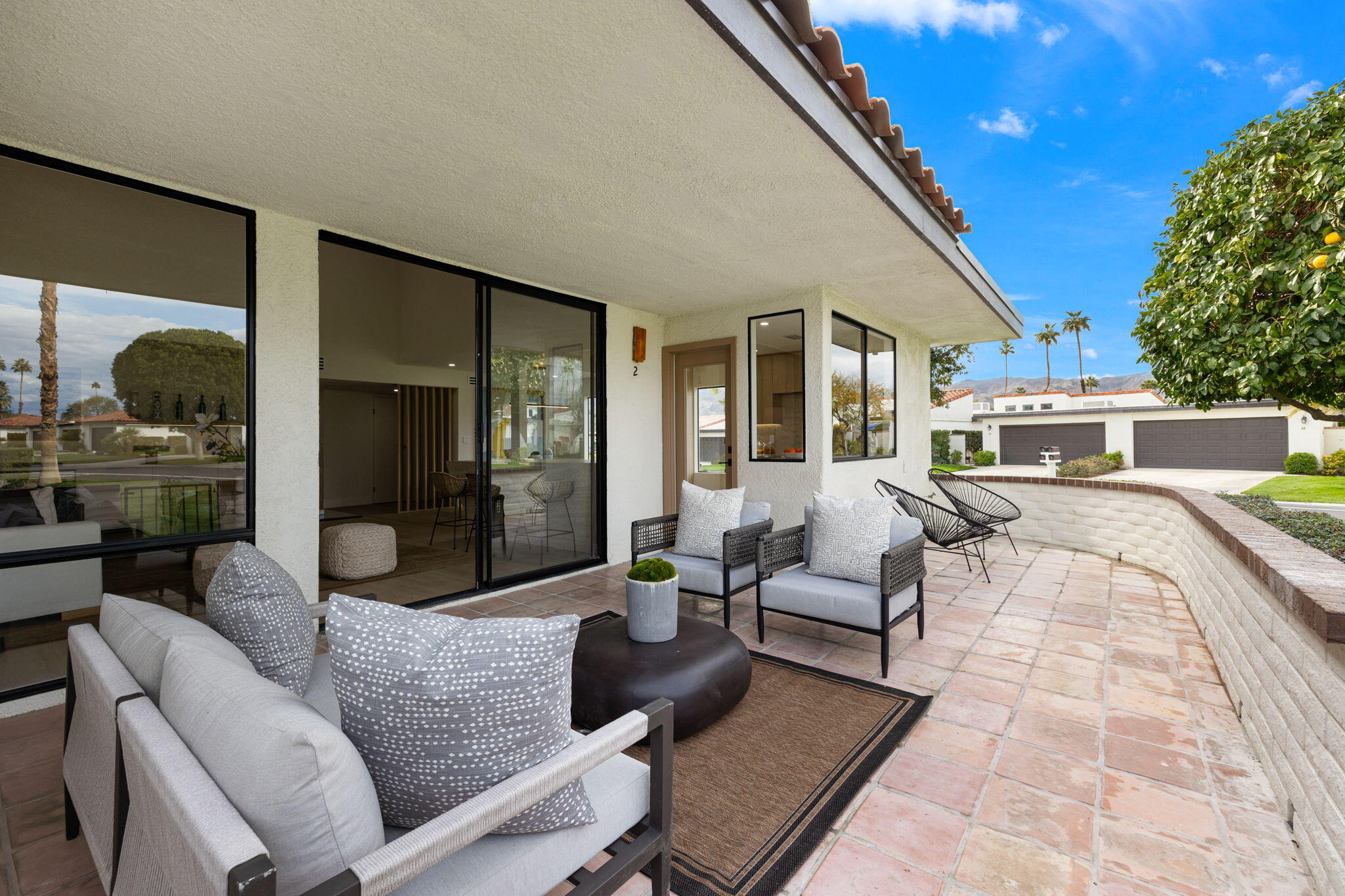 2 Leon Way Rancho Mirage, CA 92270 - Photo 45 of 55 a living room with furniture and a large window