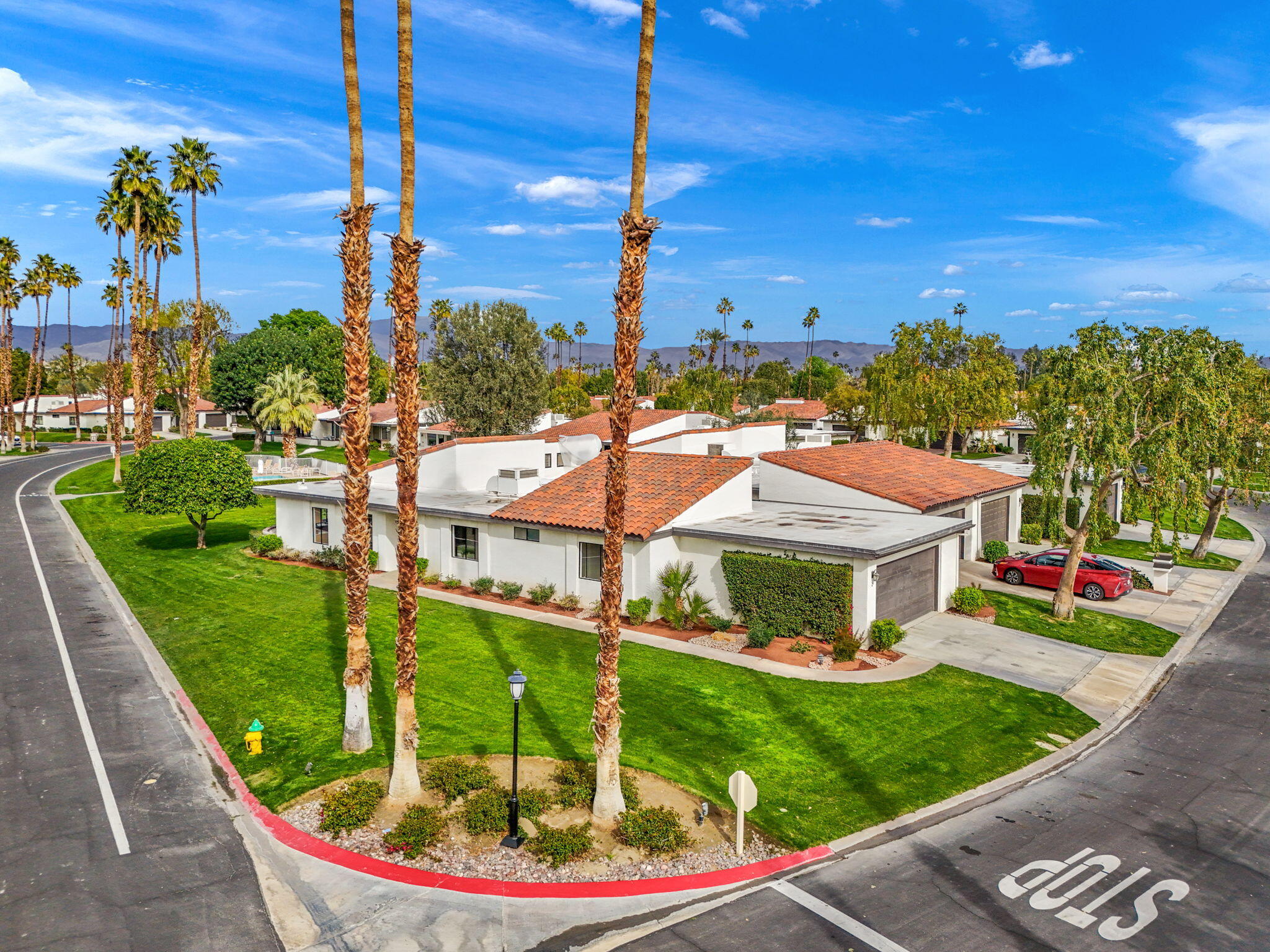 2 Leon Way Rancho Mirage, CA 92270 - Photo 49 of 55 a aerial view of a house with a garden and plants