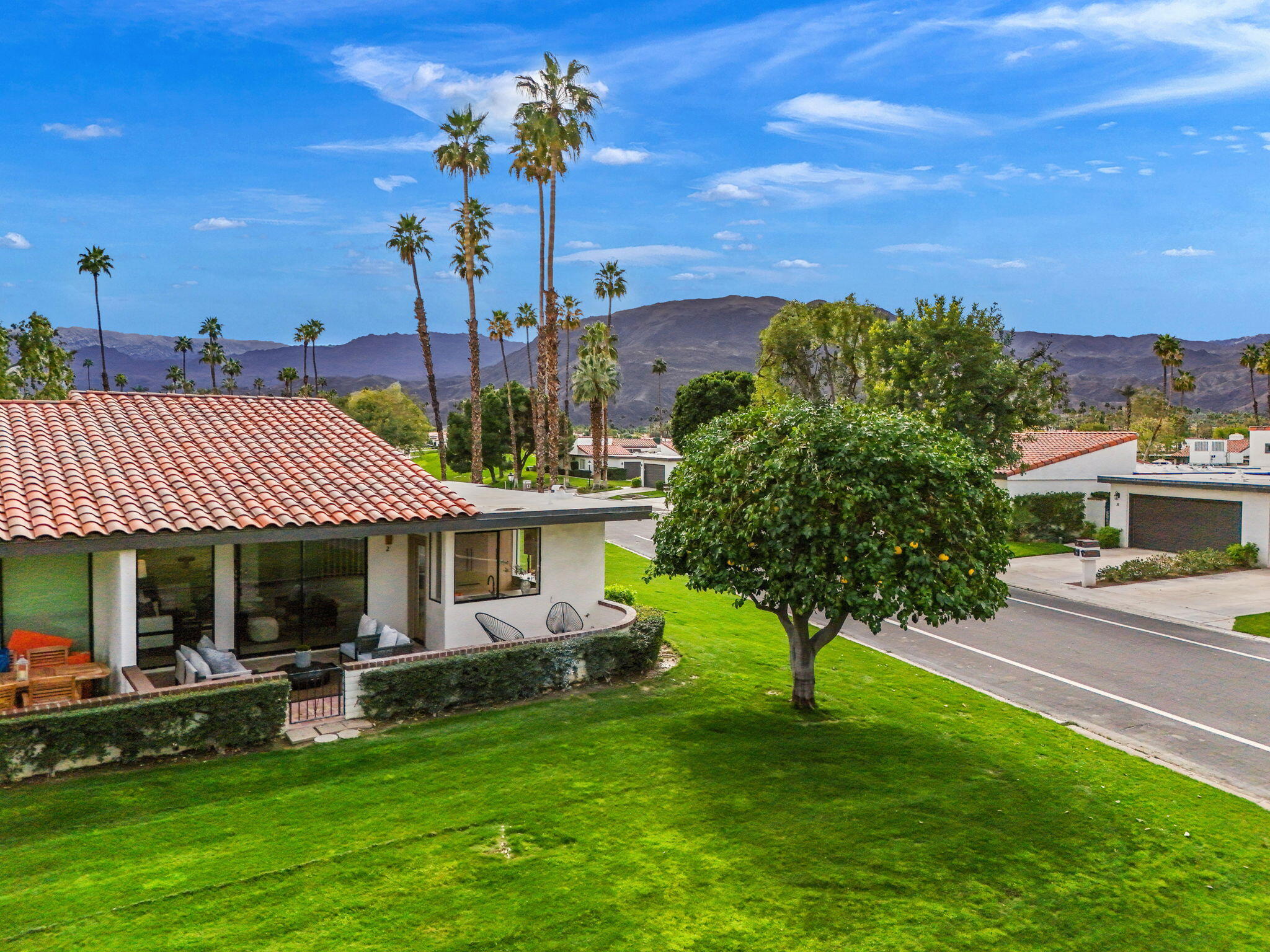 2 Leon Way Rancho Mirage, CA 92270 - Photo 54 of 55 a front view of a house with garden