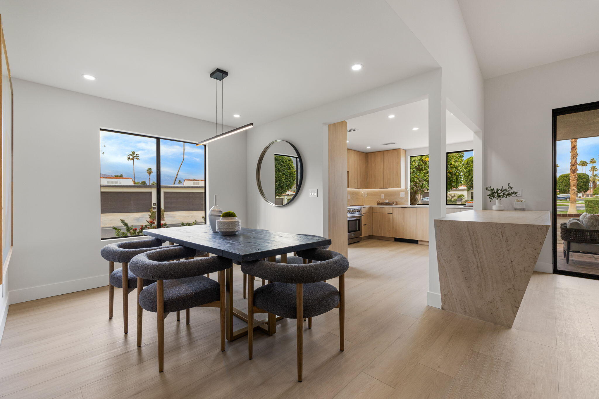 2 Leon Way Rancho Mirage, CA 92270 - Photo 7 of 55 a view of a dining room with furniture and window