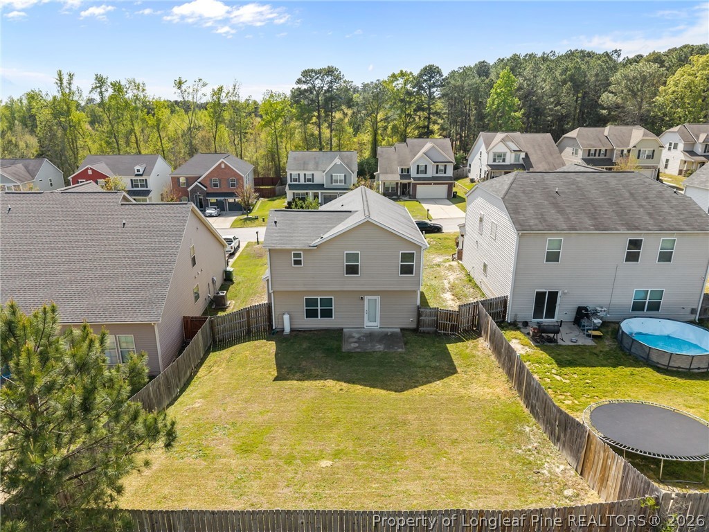 226 River Oak Street Spring Lake, NC 28390 - Photo 6 of 41 a view of a swimming pool with a patio