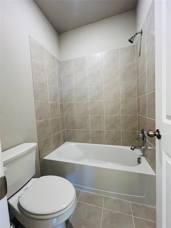 3305 Cross Shr Drive Anna, TX 75409 - Photo 31 of 31 Bathroom featuring tile patterned flooring, tiled shower / bath combo, and toilet