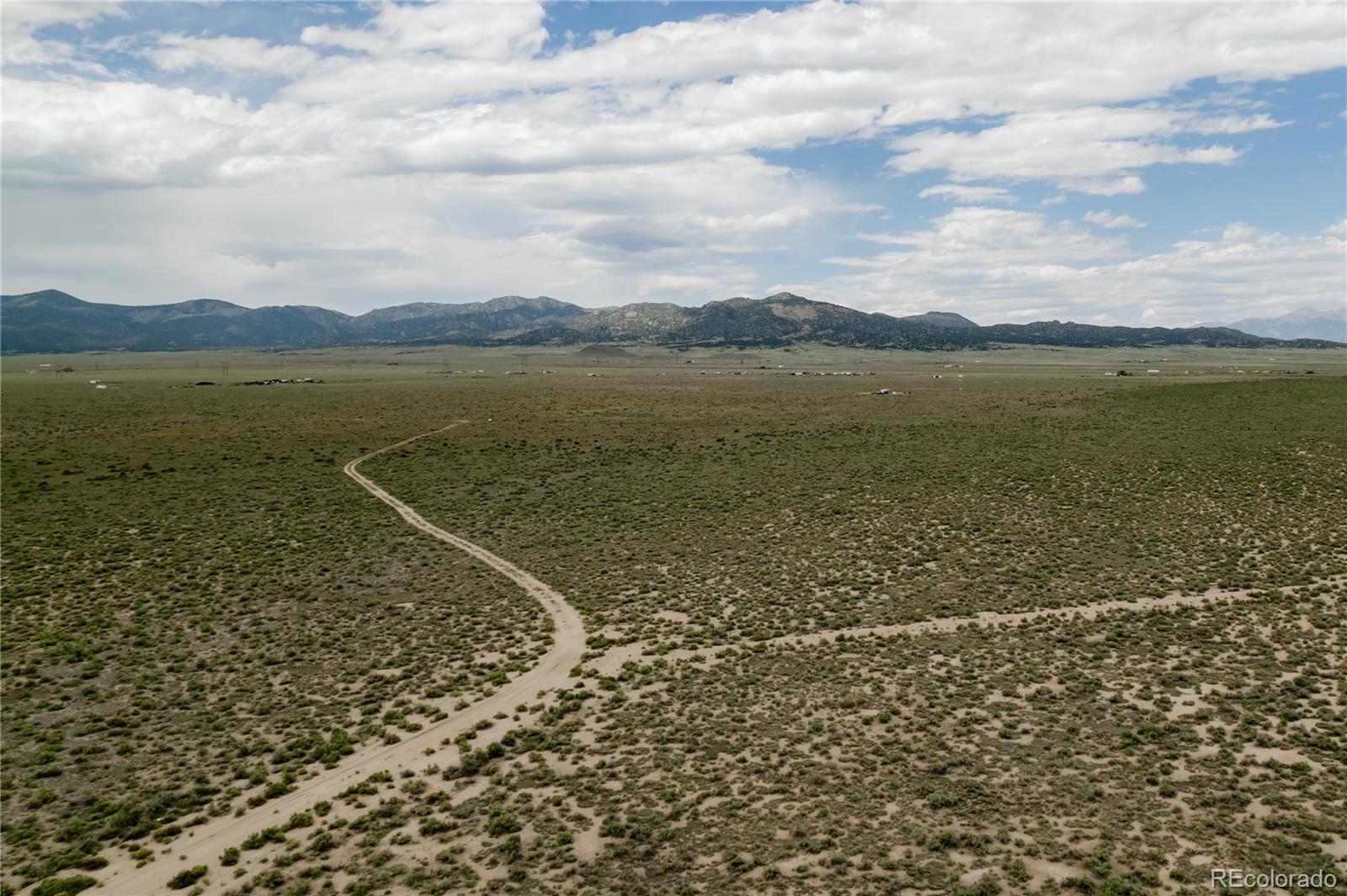 155 Ewing Ranch III Moffat, CO 81143 - Photo 1 of 6 a view of an ocean and beach
