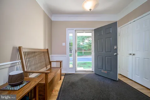 a view of a hallway with windows