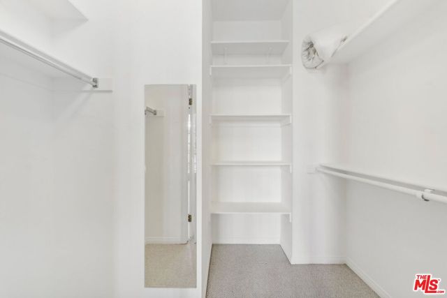 a bathroom with a double vanity sink toilet and a bathtub