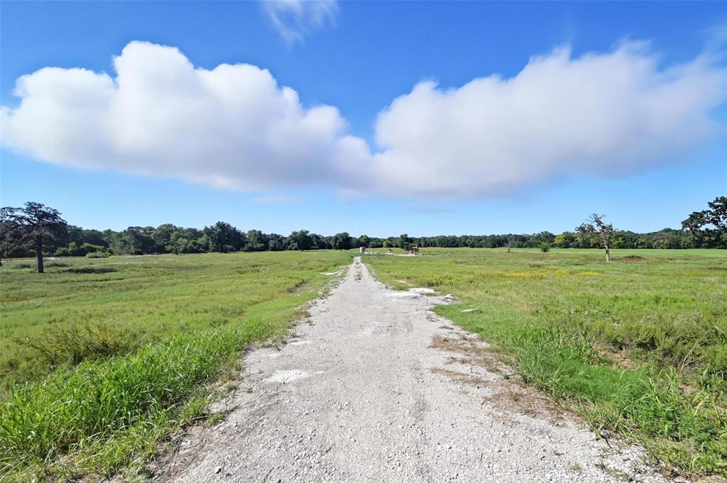159 Rio Rancho Drive Decatur, TX 76234 - Photo 8 of 11 a view of a lake with a big yard