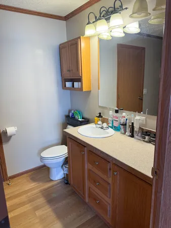 a view of an entryway with wooden floor
