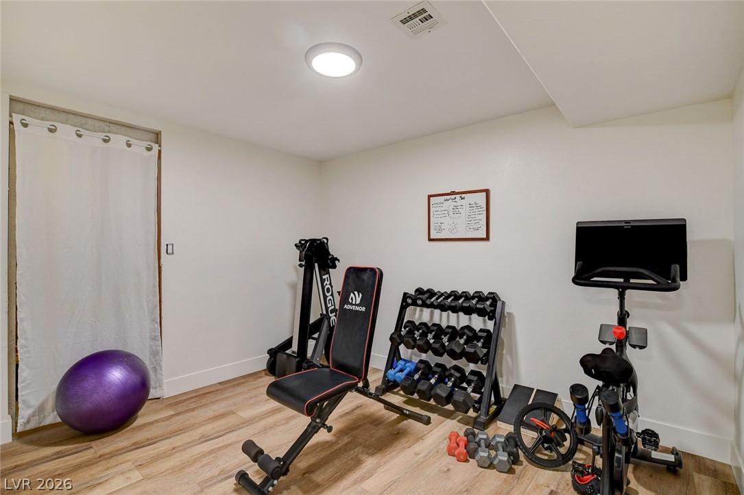 4362 Thistle Street Logandale, NV 89021 - Photo 50 of 99 Dedicate a space to wellness and fitness with a versatile home gym setup.