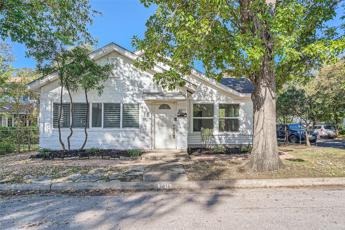 4814 Avenue G Austin, TX 78751 - Photo 1 of 1 a front view of a house with a yard