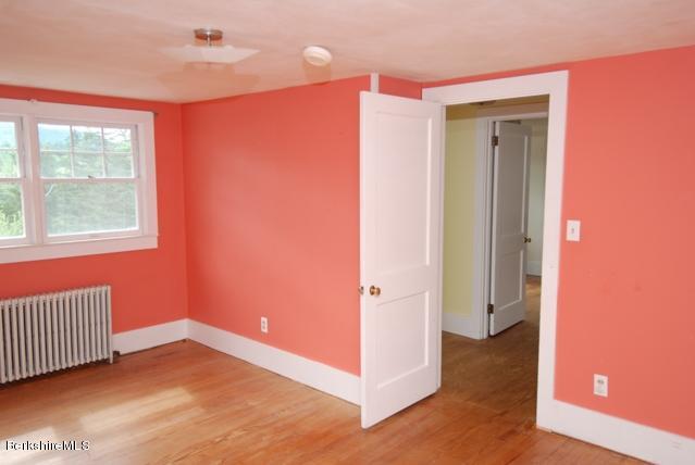48 Interlaken Road Stockbridge, MA 01262 - Photo 15 of 37 a view of an empty room with a window