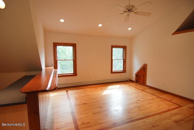 48 Interlaken Road Stockbridge, MA 01262 - Photo 18 of 37 a view of an empty room with window and wooden floor
