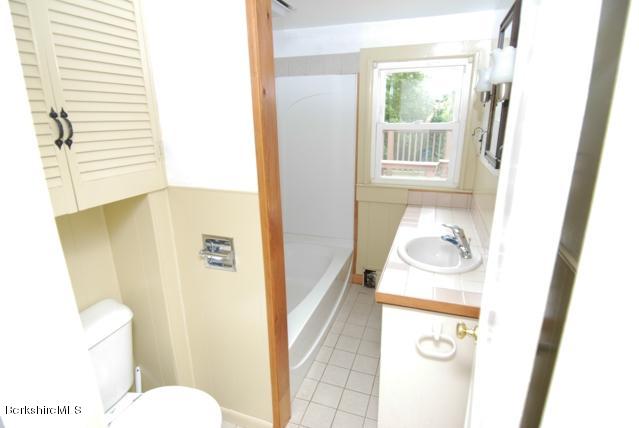 48 Interlaken Road Stockbridge, MA 01262 - Photo 25 of 37 a bathroom with a sink and toilet
