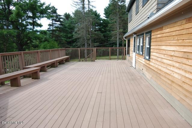 48 Interlaken Road Stockbridge, MA 01262 - Photo 29 of 37 a view of backyard with wooden floor and fence
