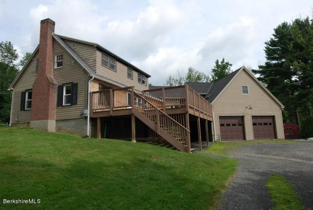 48 Interlaken Road Stockbridge, MA 01262 - Photo 33 of 37 a view of a house with a yard and large tree