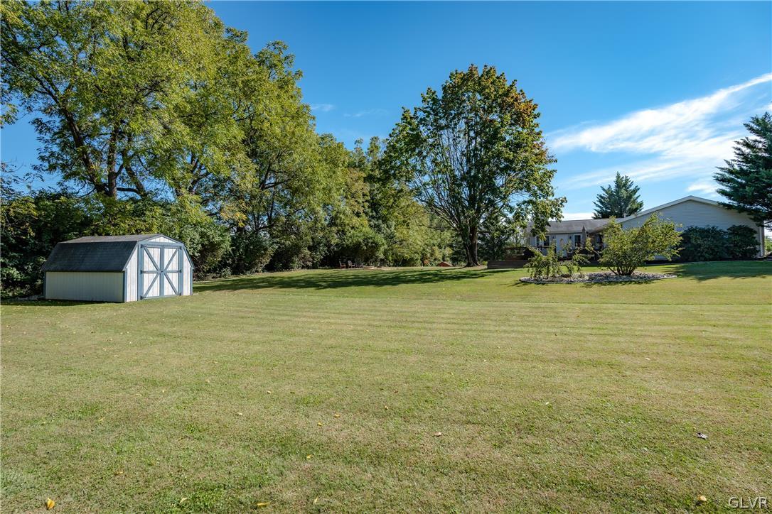 3541 Gun Club Road Nazareth, PA 18064 - Photo 3 of 41 a front view of a house with a yard