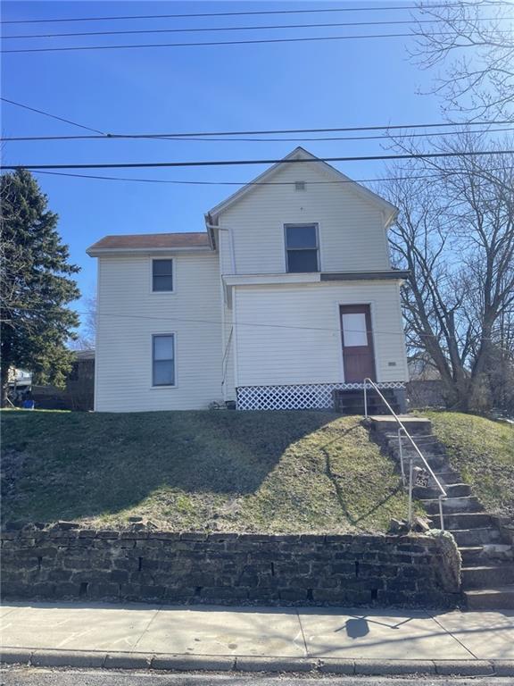 629 Forrest Street New Castle, PA 16101 - Photo 1 of 10 a view of a house with a yard