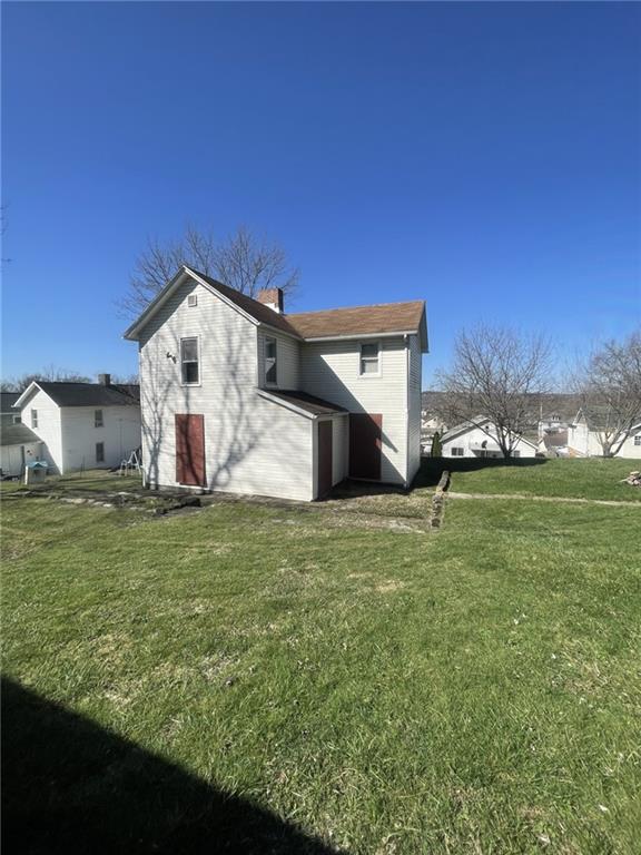 629 Forrest Street New Castle, PA 16101 - Photo 3 of 10 a front view of house with yard and trees