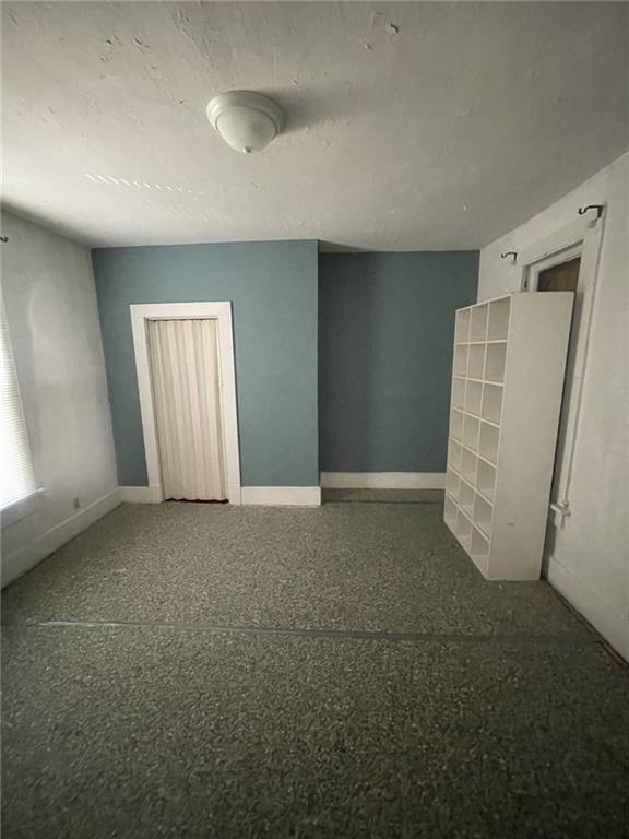 629 Forrest Street New Castle, PA 16101 - Photo 8 of 10 a view of empty room with windows