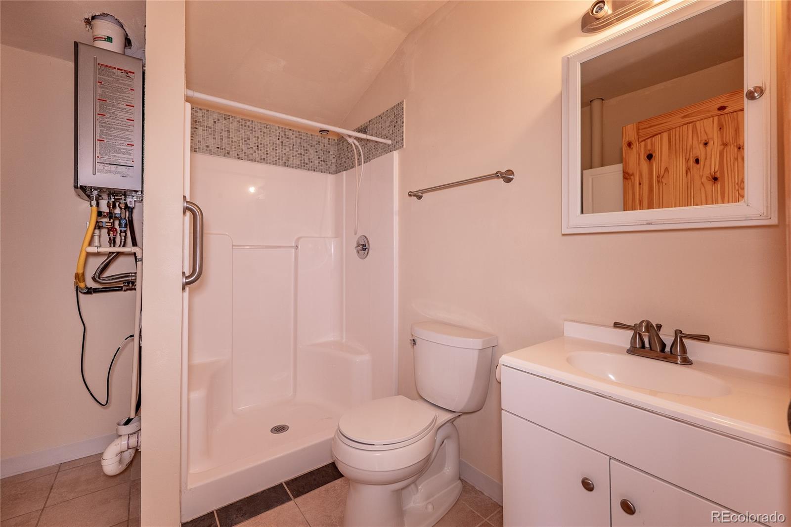 20622 Highway 69 Gardner, CO 81040 - Photo 11 of 33 a bathroom with a toilet sink and shower