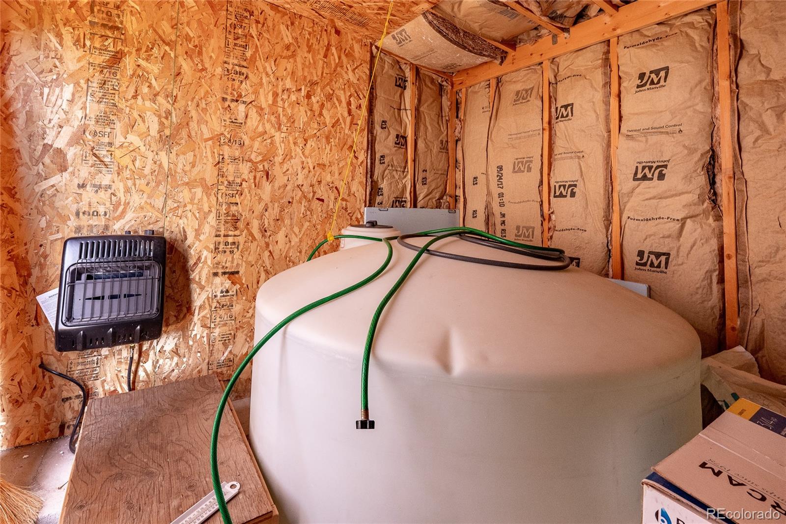 20622 Highway 69 Gardner, CO 81040 - Photo 23 of 33 a bedroom with a bed and a cabinets