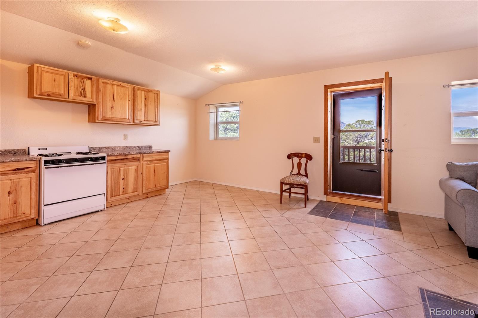 20622 Highway 69 Gardner, CO 81040 - Photo 5 of 33 a kitchen with stainless steel appliances granite countertop a stove a sink and a granite counter tops