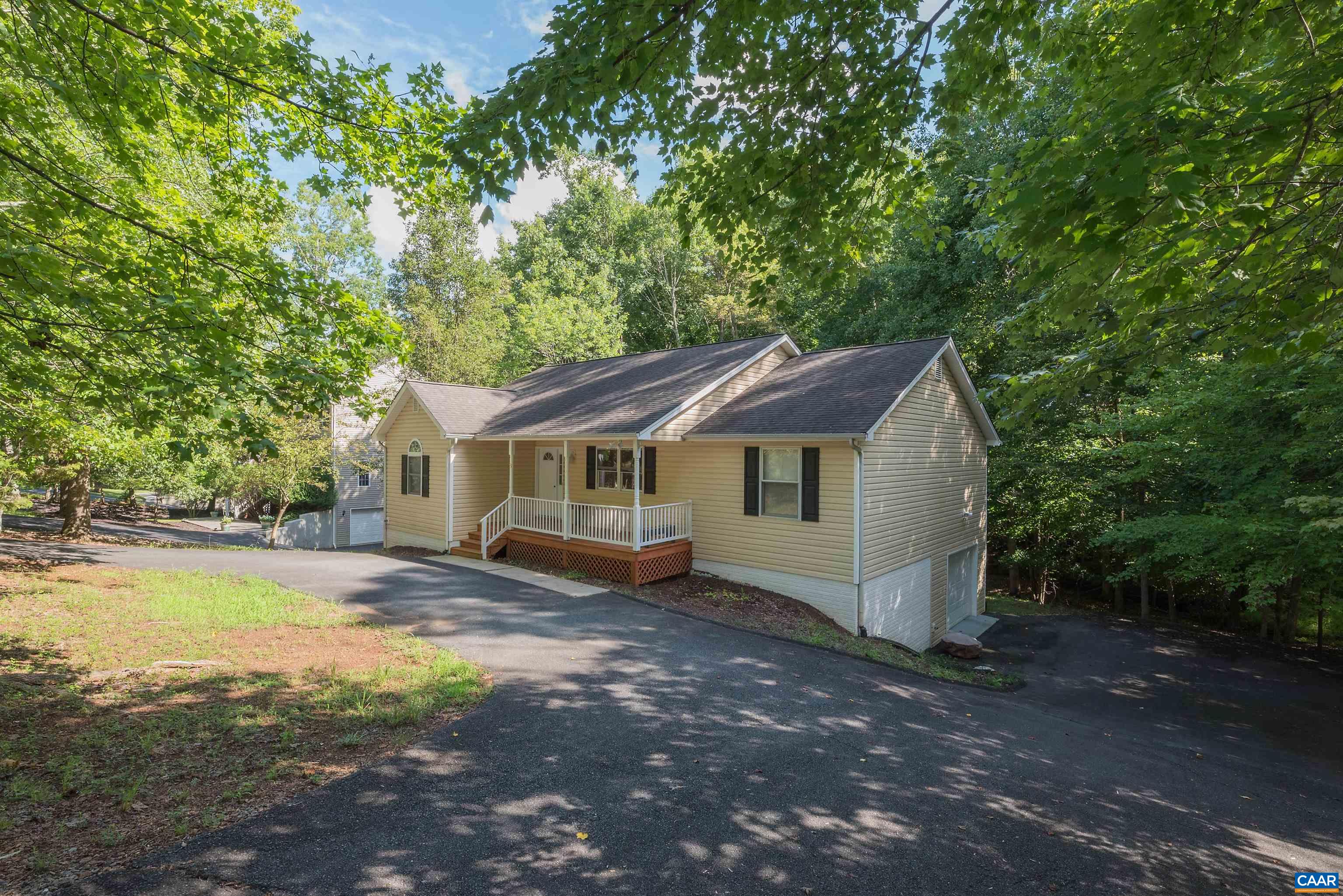 23 Zephyr Road Palmyra, VA 22963 - Photo 2 of 26 a view of a house with swimming pool next to a yard