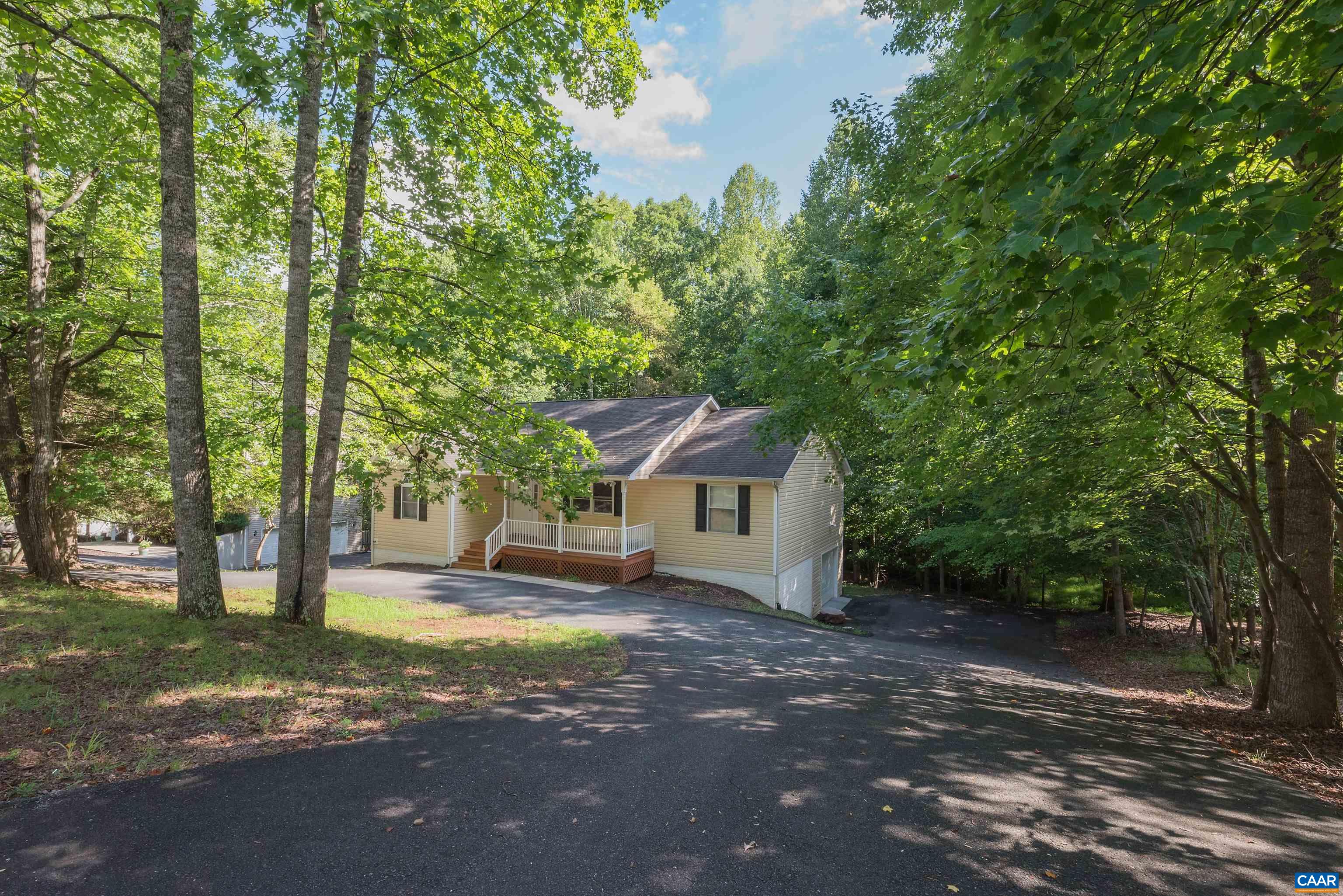 23 Zephyr Road Palmyra, VA 22963 - Photo 25 of 26 a view of a house with a tree and a yard