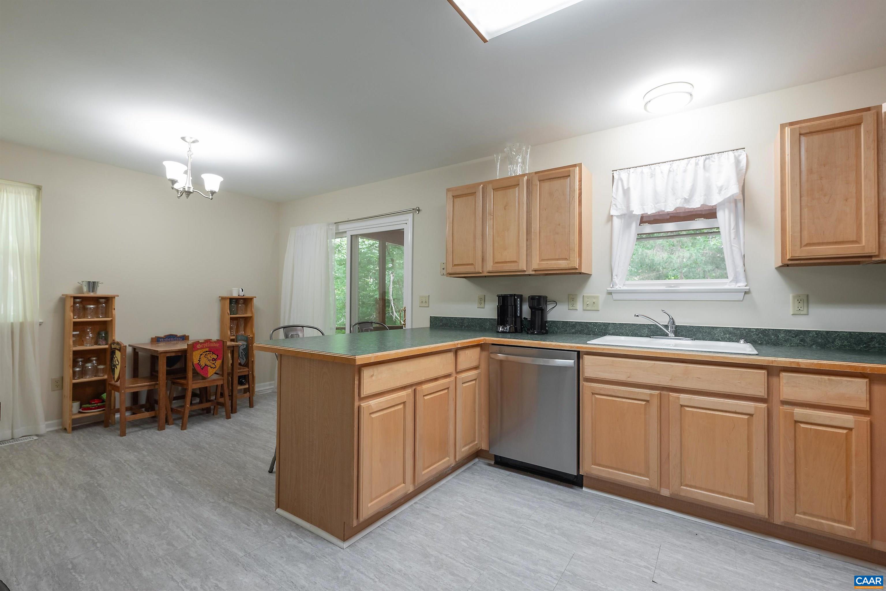 23 Zephyr Road Palmyra, VA 22963 - Photo 6 of 26 a kitchen with sink cabinets and window