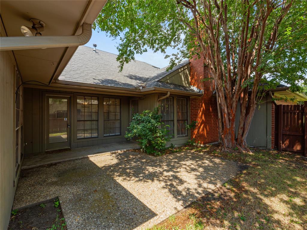4028 St Christopher Lane Dallas, TX 75287 - Photo 28 of 29 a view of a house with a patio