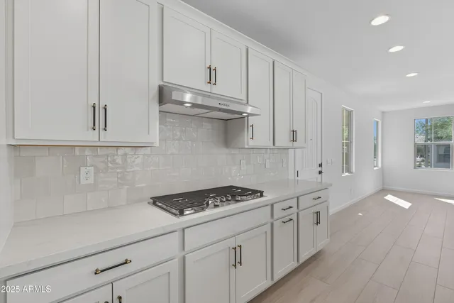a bathroom with a sink a toilet and a bathtub