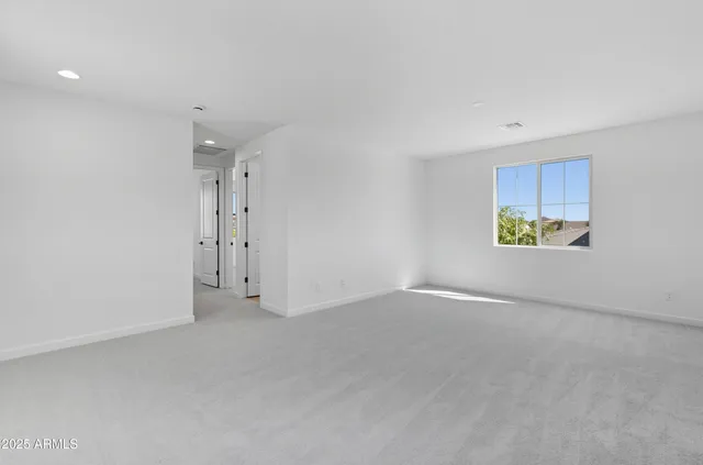 a bathroom with a sink toilet vanity and shower