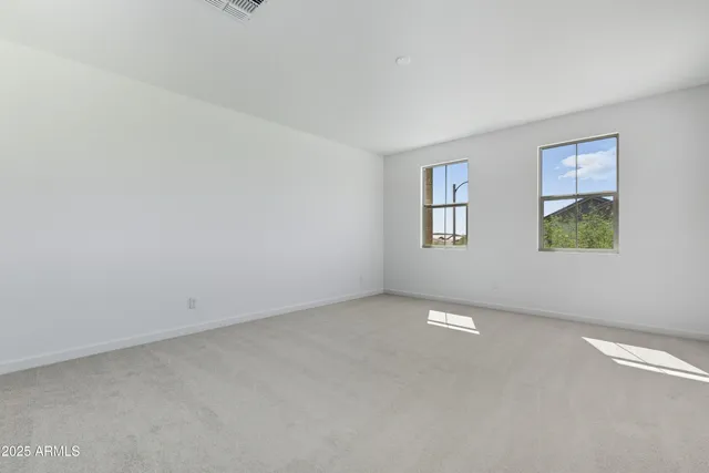 a swimming pool with yard and outdoor seating