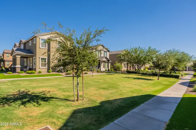 a view of a playground with basketball court