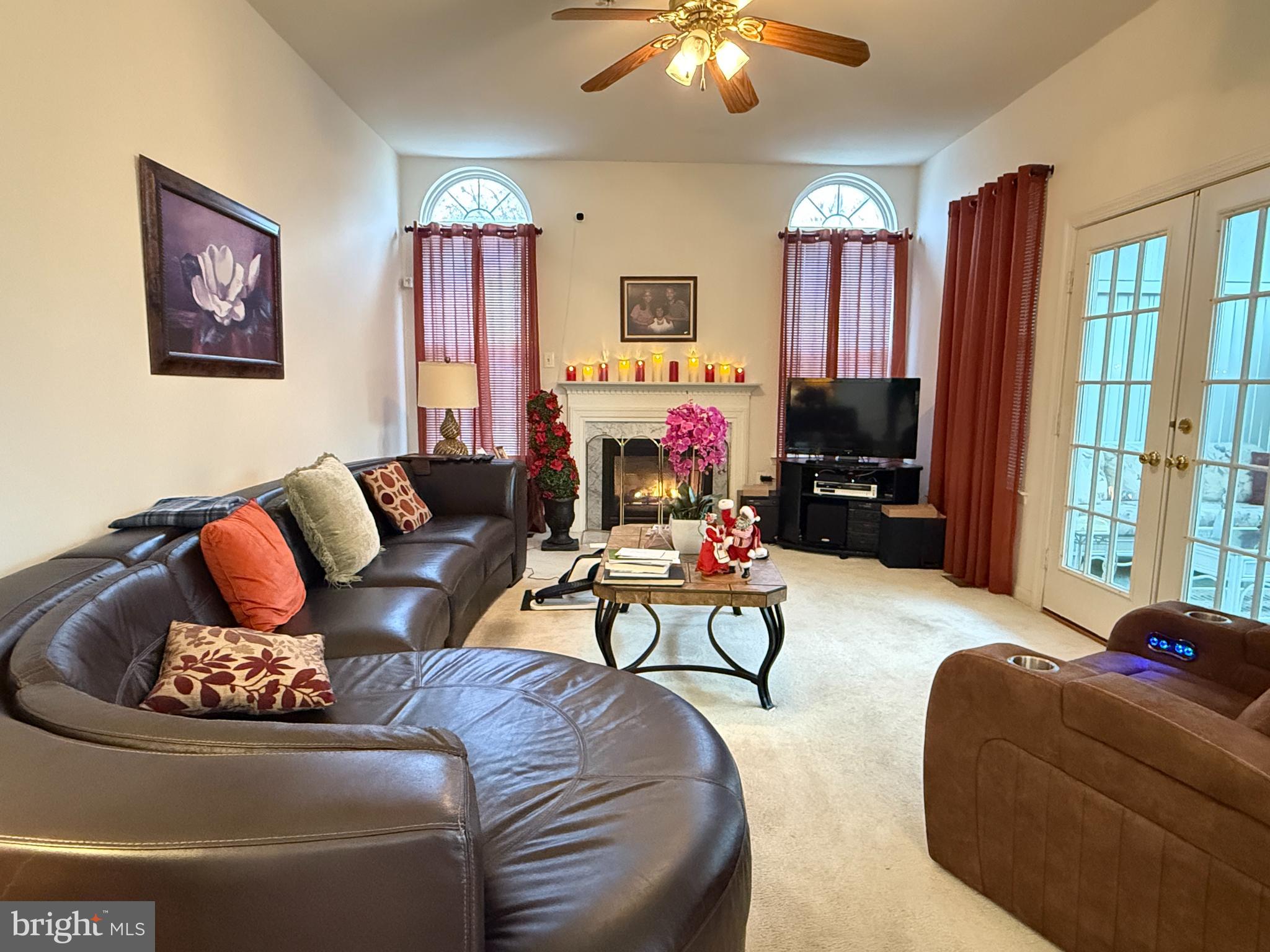 3114 Collins Street Clinton, MD 20735 - Photo 5 of 37 Step down family room w/fireplace & sunroom access