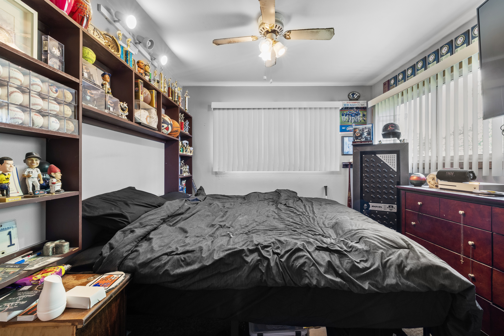 4 Saugatuck Road Montgomery, IL 60538 - Photo 19 of 24 a bedroom with a bed dresser and a window