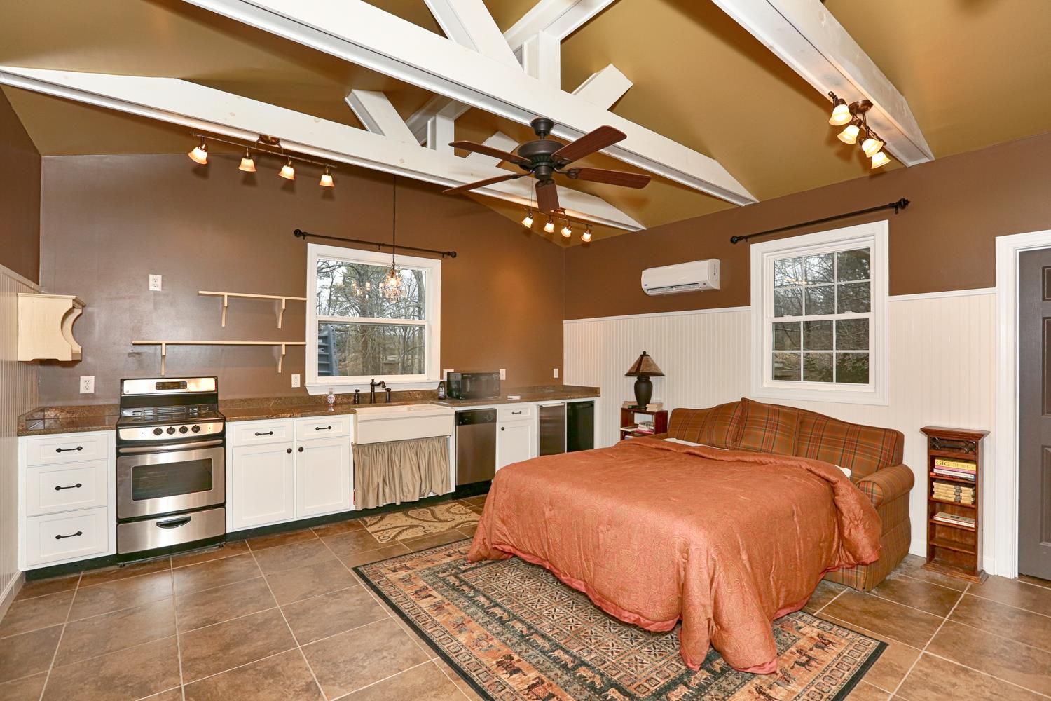 17 Lewter Road Taft, TN 38488 - Photo 14 of 30 a spacious bedroom with a bed and window