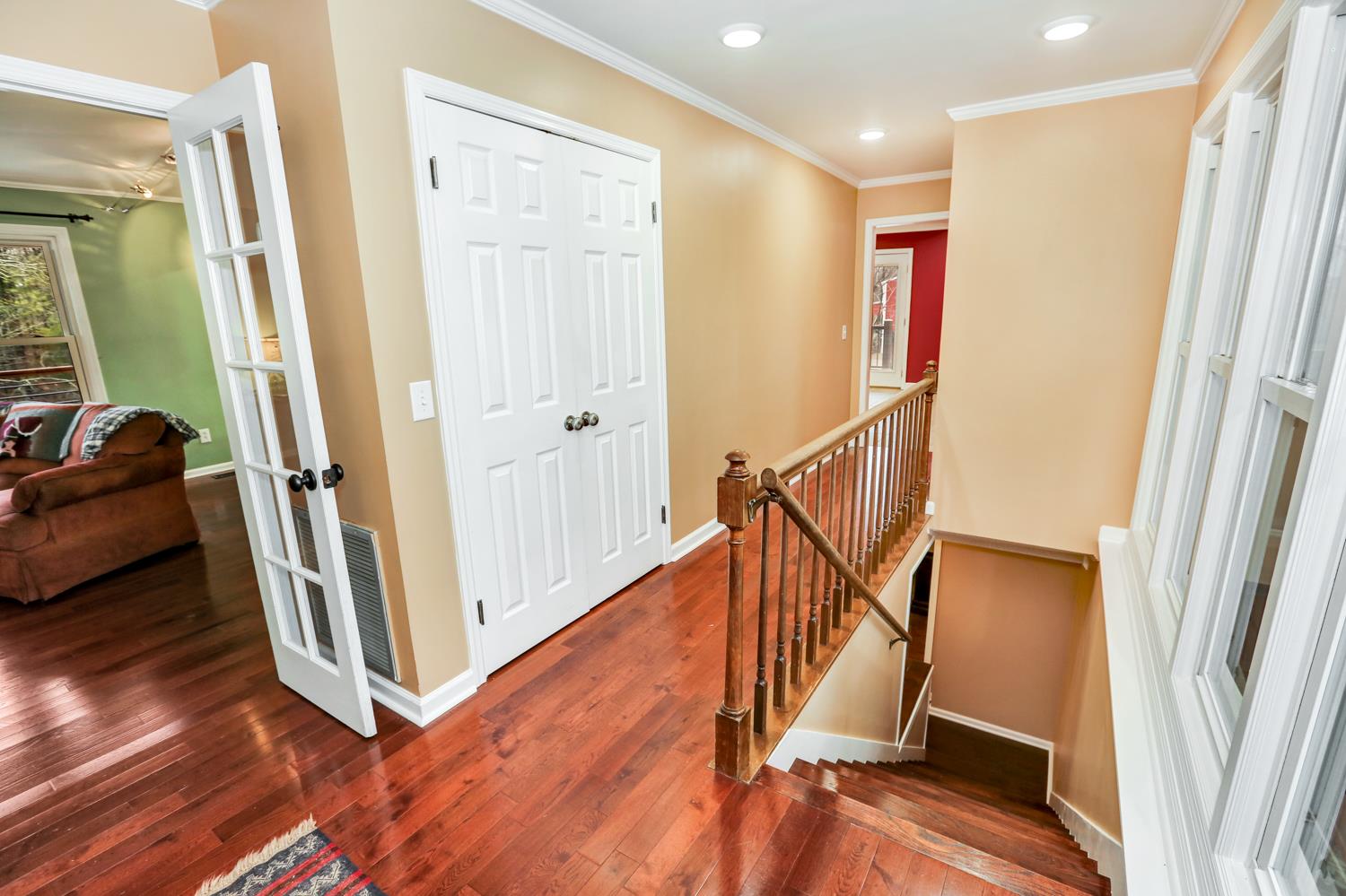 17 Lewter Road Taft, TN 38488 - Photo 16 of 30 a view of a hallway with wooden floor and stairs