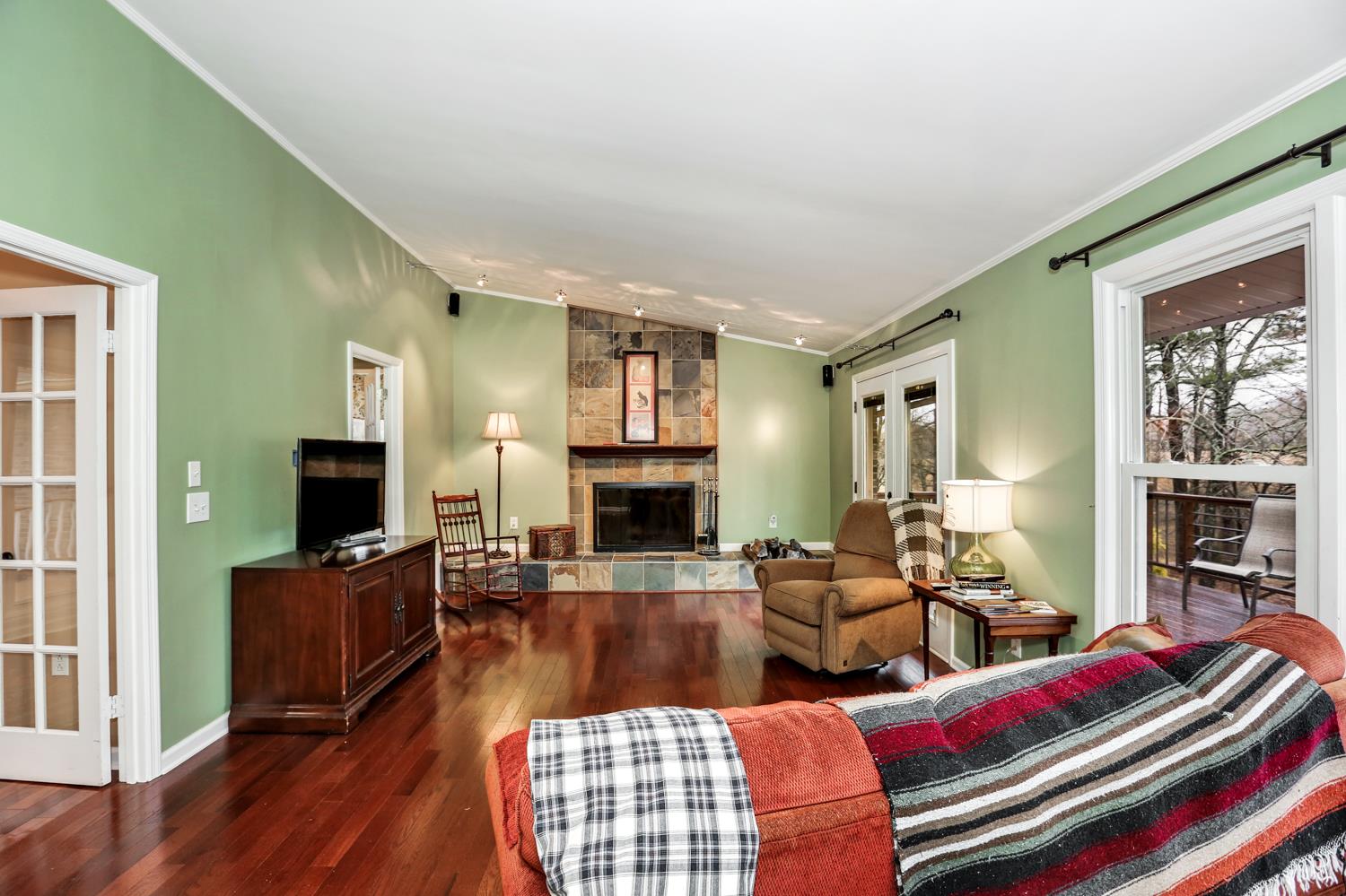 17 Lewter Road Taft, TN 38488 - Photo 17 of 30 a living room with fireplace furniture and a flat screen tv