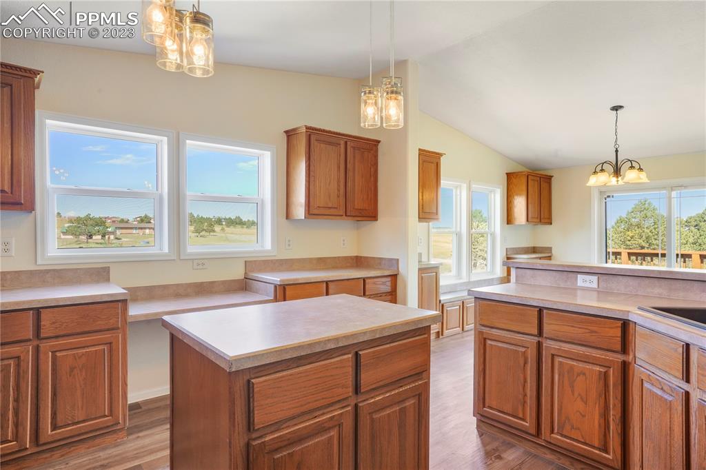 12825 Mc Cune Road Elbert, CO 80106 - Photo 17 of 50 a kitchen with a sink stove and microwave