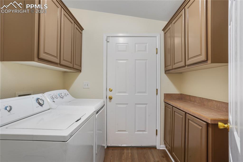 12825 Mc Cune Road Elbert, CO 80106 - Photo 33 of 50 a utility room with dryer and washer